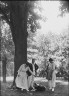 Arnold Genthe / Leslie, Margeurite, and friends, standing under a tree / 1917 Aug. 18