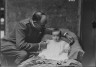 Arnold Genthe / Stimson, H.B., Lieutenant, and baby, portrait photograph / 1918 May 8