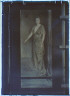 Arnold Genthe / Photograph of a painting of a woman standing and holding a walking stick or a cane / between 1906 and 1942