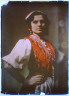 Arnold Genthe / Member of the International Institute for Immigrant Girls, Y.W.C.A., in national costume / 1915