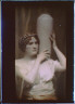 Arnold Genthe / Woman supporting a large vase on one shoulder / between 1906 and 1942