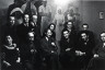 David Seymour / Henri Barbusse (center) surrounded by leading left-wing intellecutals in his office of the literary journal 'Monde', Paris / about 1935