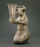 Southwestern Iran / Kneeling bull holding a spouted vessel / 3100-2900 B.C.