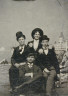 Unknown / Studio Portrait in front of Cliff House [four young men in hats] / ca. 1880s-1890s