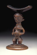 Headrest Supported by Standing Female Figure