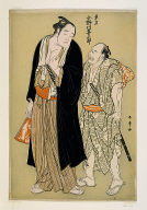 The sumo wrestler Onogawa Kisaburo of the Eastern Group, with an attendant