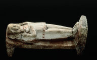 Female figure on a bed