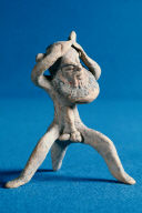 Seated tripodic satyr