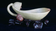 Water container in the form of a lotus petal