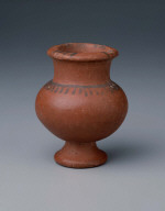 Red vase with foot