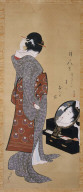Woman Looking at Herself in a Mirror