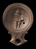 Lamp with depiction of a gladiator