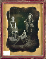 Two Children with Toys