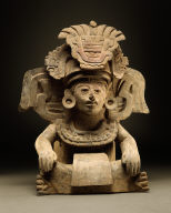 Seated Deity Urn