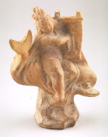 Boy mounted on dolphin and playing a harp