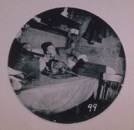 Chinatown Album: Two Men Reclining on a Bed
