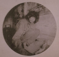 Chinatown Album: Man Sitting Cross-Legged on a Rug