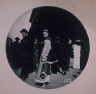 Chinatown Album: Man Walking with a Child