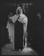 Person wearing a mask made by W.T. Benda