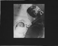 Mother holding a baby, Chinatown, San Francisco