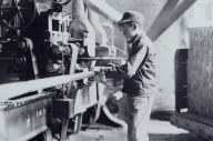Indiana Manufacturing Company, Boy Taking Boards Away from "Double Cut-off" Machine. A Suggestive Name! Peru, Indiana