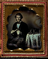 Folk Artist with Carved Wooden Chain