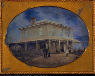 Square House, Man, Child, and Dog on Lawn
