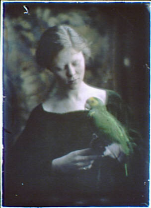 Miss Holt holding a parrot - The AMICA Library